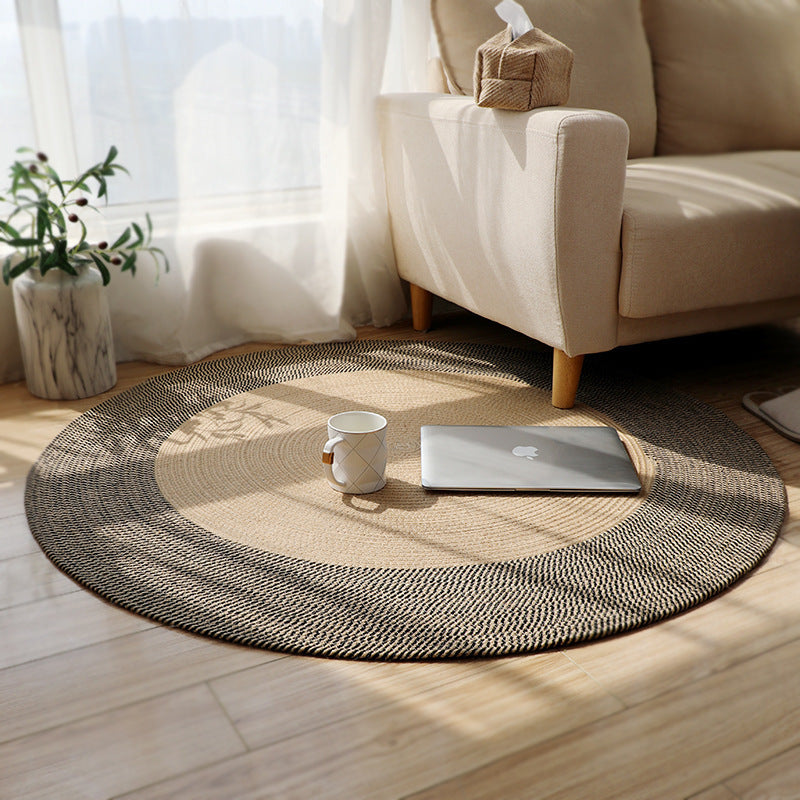Noir Edge Round Raffia Rug – Minimalist Natural Fiber Floor Mat in Sand & Black
