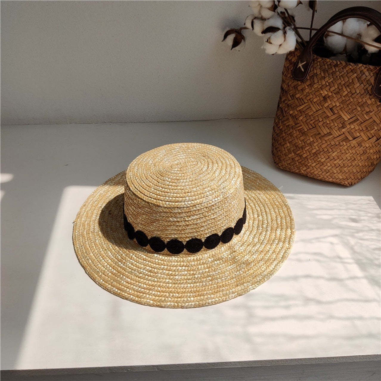 Luna Boater Raffia Hat – Handwoven Straw Hat with Black Dot Trim