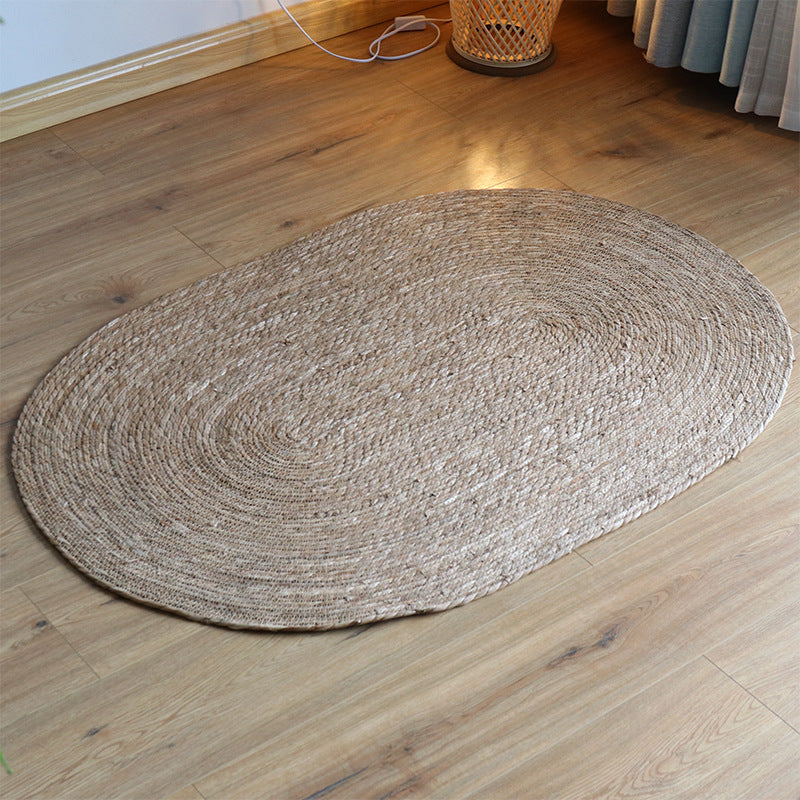 Naturra Oval Raffia Rug – Handwoven Natural Fiber Floor Mat